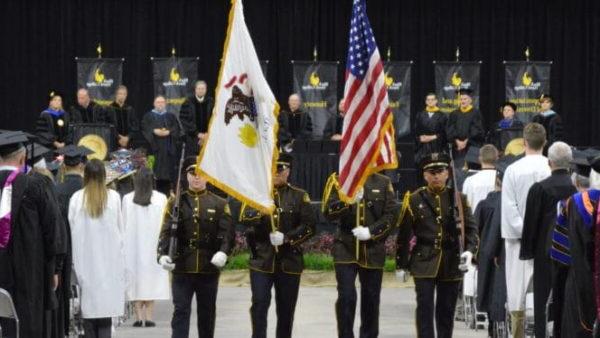 A group of soldiers holding flags